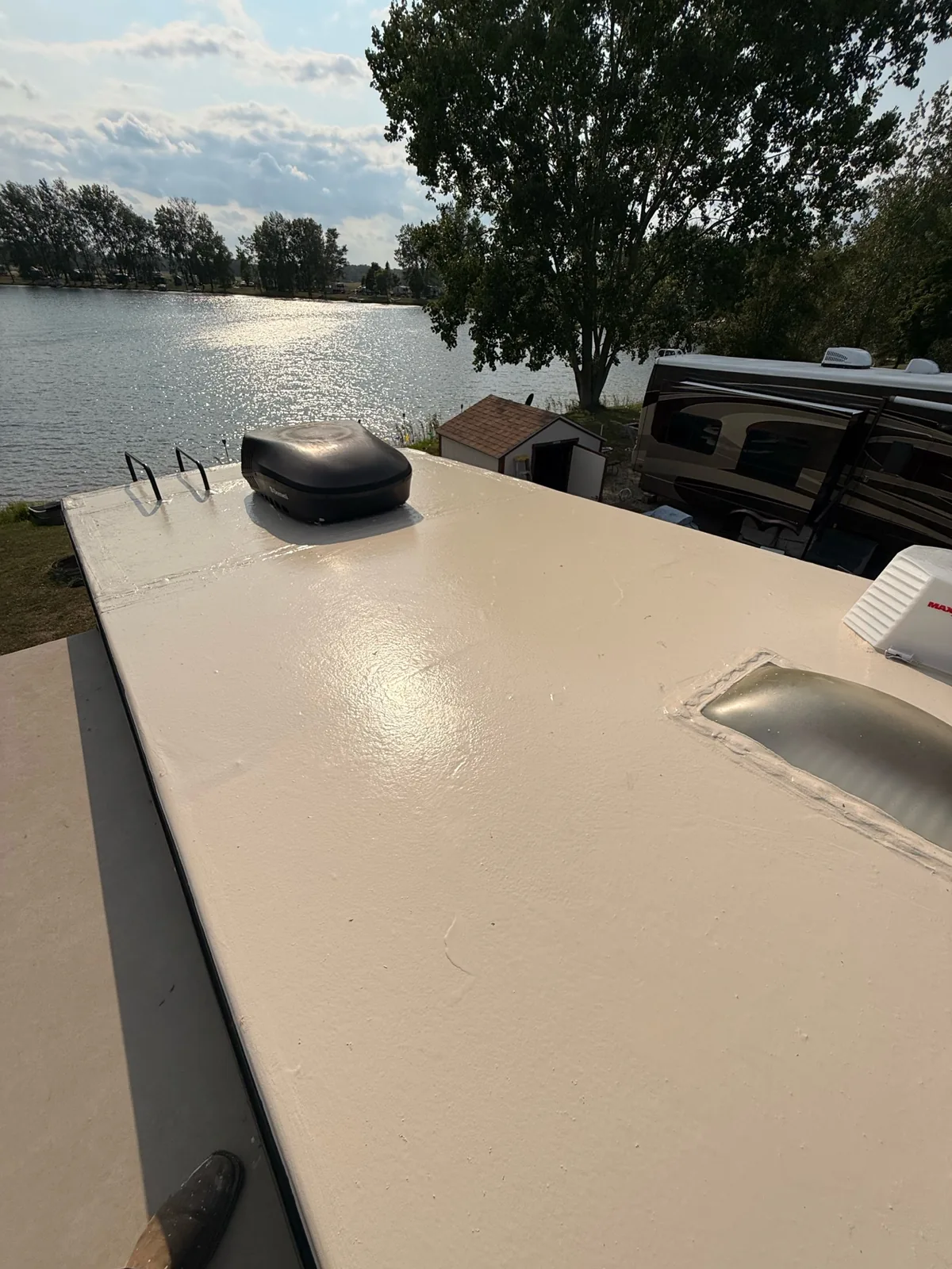 Close view of Crazy Seal roof protection around RV rooftop components